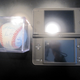 Illustration for article titled Is The DSi LL Bigger Than Uncharted 2, Nolan Ryans Autograph, A Can of Beer?